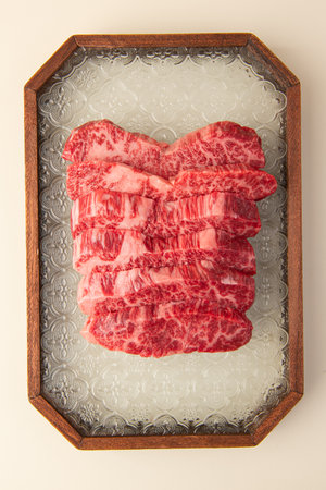 Raw fresh wagyu beef sliced on white backgroundの写真素材