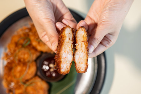 Crispy fried pork cutlet with sweet and sour sauce.