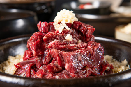 Beef sirloin on a hot pot, close-upの写真素材