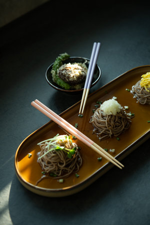 Soba noodles with chopsticks on a plate, Japanese food styleの写真素材