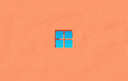 Empty concrete grunge wall. 3d rendering of city house with clear sky background. Detail of house exterior wall with small window. 3d rendering.の写真素材