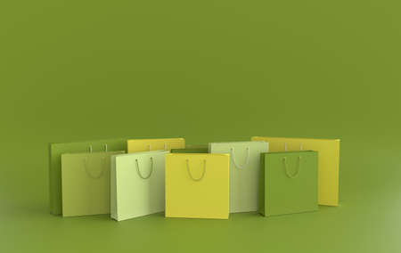3D render illustration. Set of colorful paper shopping bags on green background. Concept of commercial business retail sale and online shoppingの写真素材