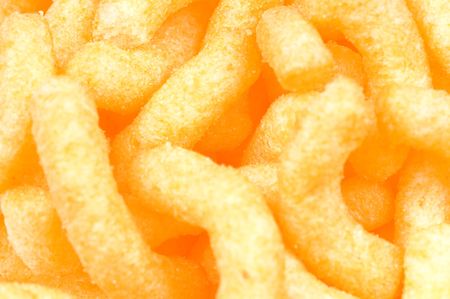 Cheese chips as a backgroundの写真素材