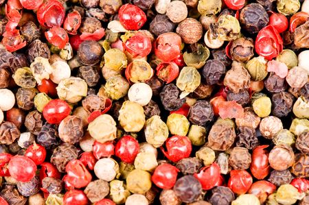 Different types of pepper as a background
