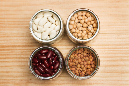 Beans, lentils and and chickpeas in jarsの写真素材