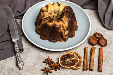 A chocolate and vanilla marble cake on a plateの写真素材