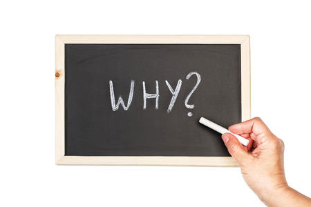 A blackboard with why? in chalkの写真素材