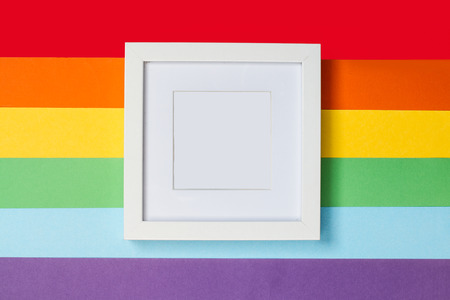 A white and clean portrait on a gay pride flagの写真素材