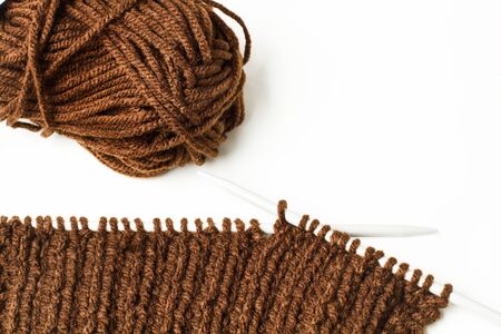 Wool and needles to knit a scarfの写真素材