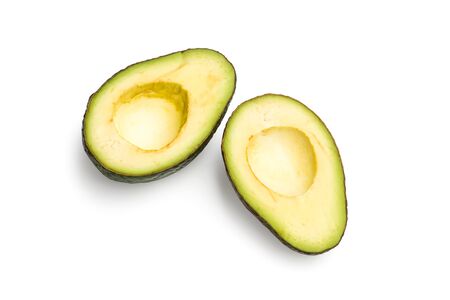Halved avocado without seed on a white backgroundの写真素材