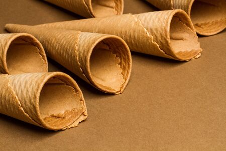 Ice cream cones on a brown background