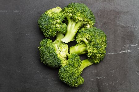 Broccoli on a black slate slab