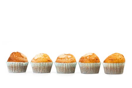 Vanilla and sugar cupcakes on a white backgroundの写真素材