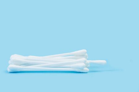 Cotton swabs on a light blue backgroundの写真素材