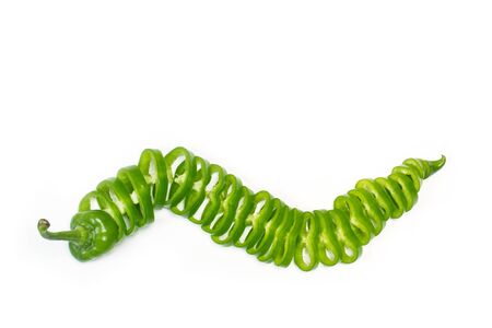 Sliced italian green pepper on a white background
