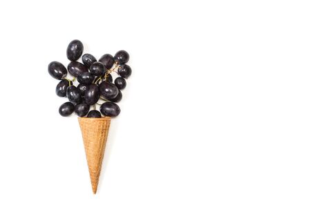 Black graves in a wafer cone and on a white background
