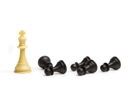 White chess king and black chess pawns down