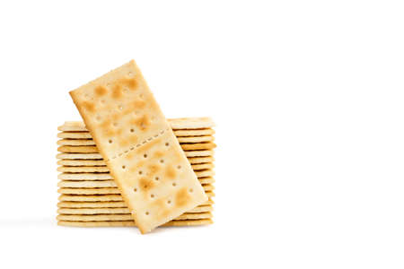 A heap of cracker biscuits on a white backgroundの写真素材