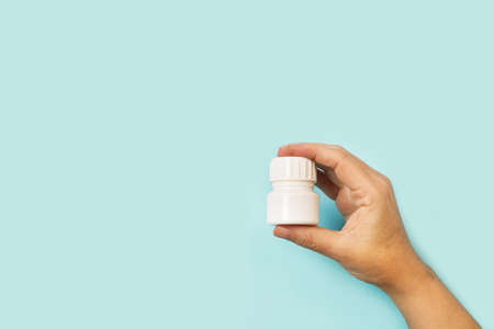 Round pieces of wood on a green backgroundの写真素材