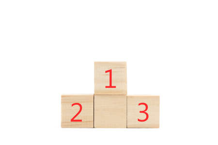 A podium made with wooden blocks on a white backgroundの写真素材
