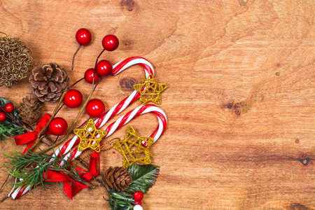 Christmas ornaments on a wooden background with copy space