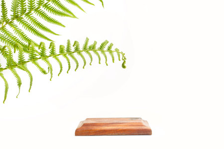 A square wooden base on a white background with copy spaceの写真素材