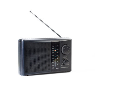 Vintage style radio receiver on a white background with copy spaceの写真素材