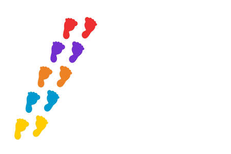 A path of colored footprints on a white background with copy spaceの写真素材