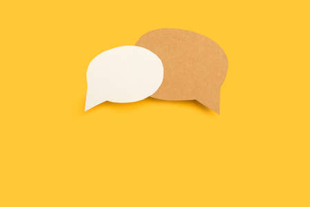 Blank speech bubbles with copy space on a yellow backgroundの写真素材