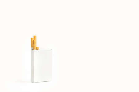 A packet of cigarettes on a white background with copy spaceの写真素材