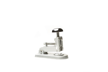 An old style stapler isolated on a white background with copy spaceの写真素材