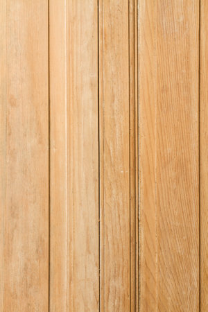 A wooden background with ornaments in a close up viewの写真素材