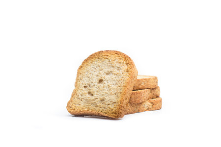 Slices of toasted bread on a white background with copy space