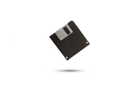 A floppy disk floating on a white background with copy spaceの写真素材