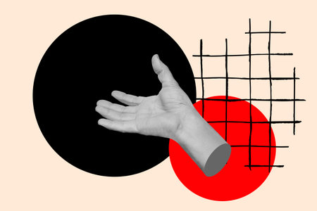 An open man hand on red and black circles on a squared backgroundの写真素材