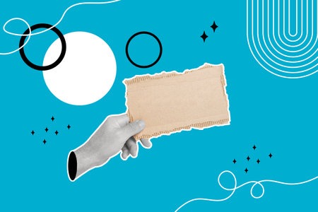 Collage of a hand holding a blank piece of cardboard on a blue background with circlesの写真素材