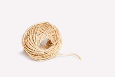 A ball of sisal twine isolated on a white backgroundの写真素材