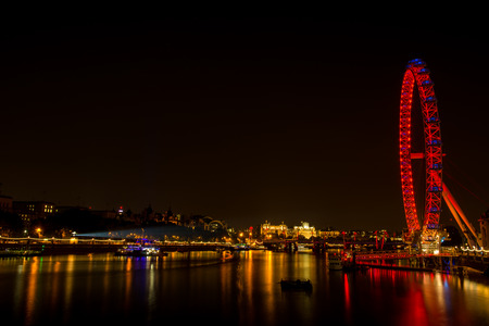 NIght view on London  famous landmark London Eye Wheel on river Thamesのeditorial素材