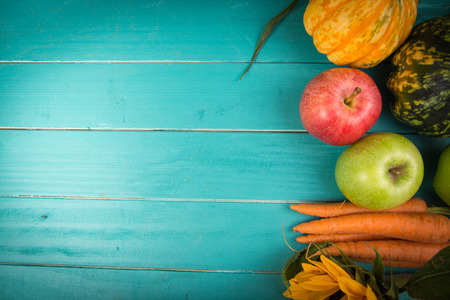 Farm fresh organic vegetables on rustic wooden blue table backgroundの写真素材