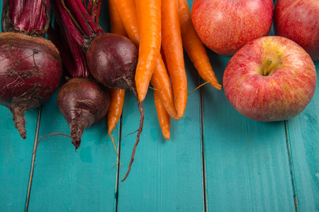 Farm fresh organic vegetables on rustic wooden blue table backgroundの写真素材