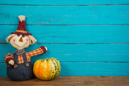 Halloween funny  scarecrow on wooden backgroundの写真素材