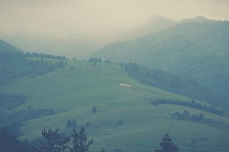 Polish mountains landscape in fogの写真素材