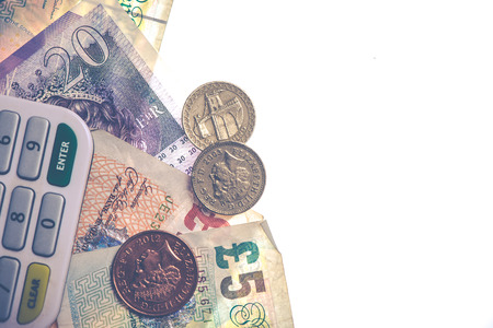 isolated british coins and notesの写真素材