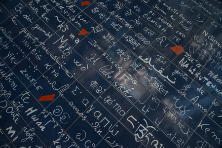 Wall of love. I love you signs on black wall on Le mur des je t'aime in Paris, France.の写真素材