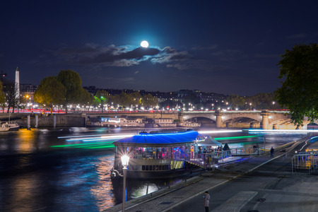 Night slow motion view on river Seine in Paris, Franceの写真素材