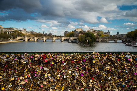  Panoramic view on Paris Ponte des Arts over river Seine. Famous from love lock left by lovers from...