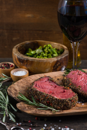 Beef steak fillet with pepper on rustic tableの写真素材