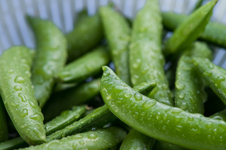 Fresh wet whole petite peas