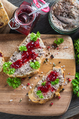 homemade meat spread on fresh bread from aboveの写真素材