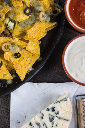 mexican hot street food nachos with salsa dip from aboveの写真素材